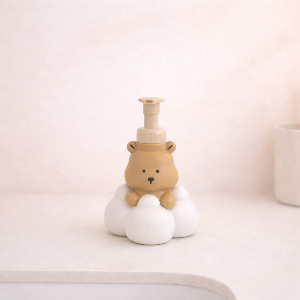 Cute bear-shaped liquid soap dispenser with cloud base, kawaii plastic bathroom accessory for hand soap.