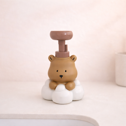 Cute bear-shaped foam soap dispenser with cloud base, kawaii bathroom accessory for hand washing.