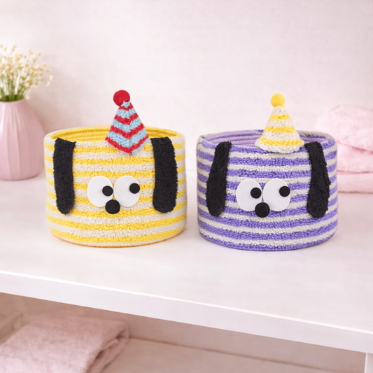 Cute puppy storage baskets with striped fabric, floppy ears, and party hats, playful plush organizers for nursery or shelves.