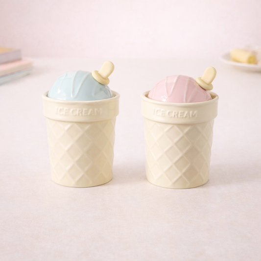 Pastel ice cream–shaped ceramic cups with lids, waffle-textured containers in soft blue and pink, cute dessert-inspired storage jars.