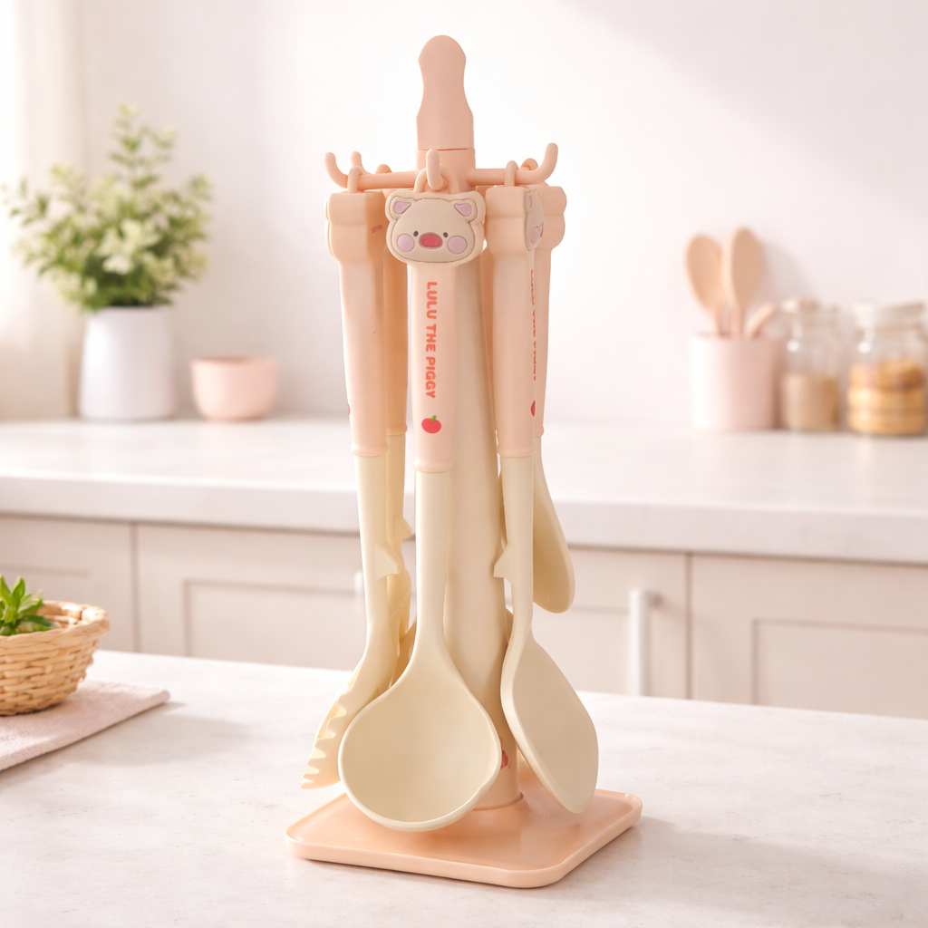 Silicone kitchen utensils set with hanging stand, cute pastel cooking tools collection for modern kitchen decor.