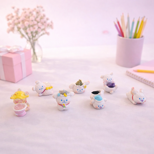 Cute mini puppy figurines holding stones, kawaii desk decor collectibles for shelves and gift displays.
