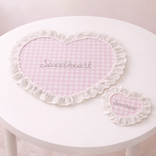 Heart-shaped lace placemats with pink gingham center, romantic cottage-style table mats for dining or decor.