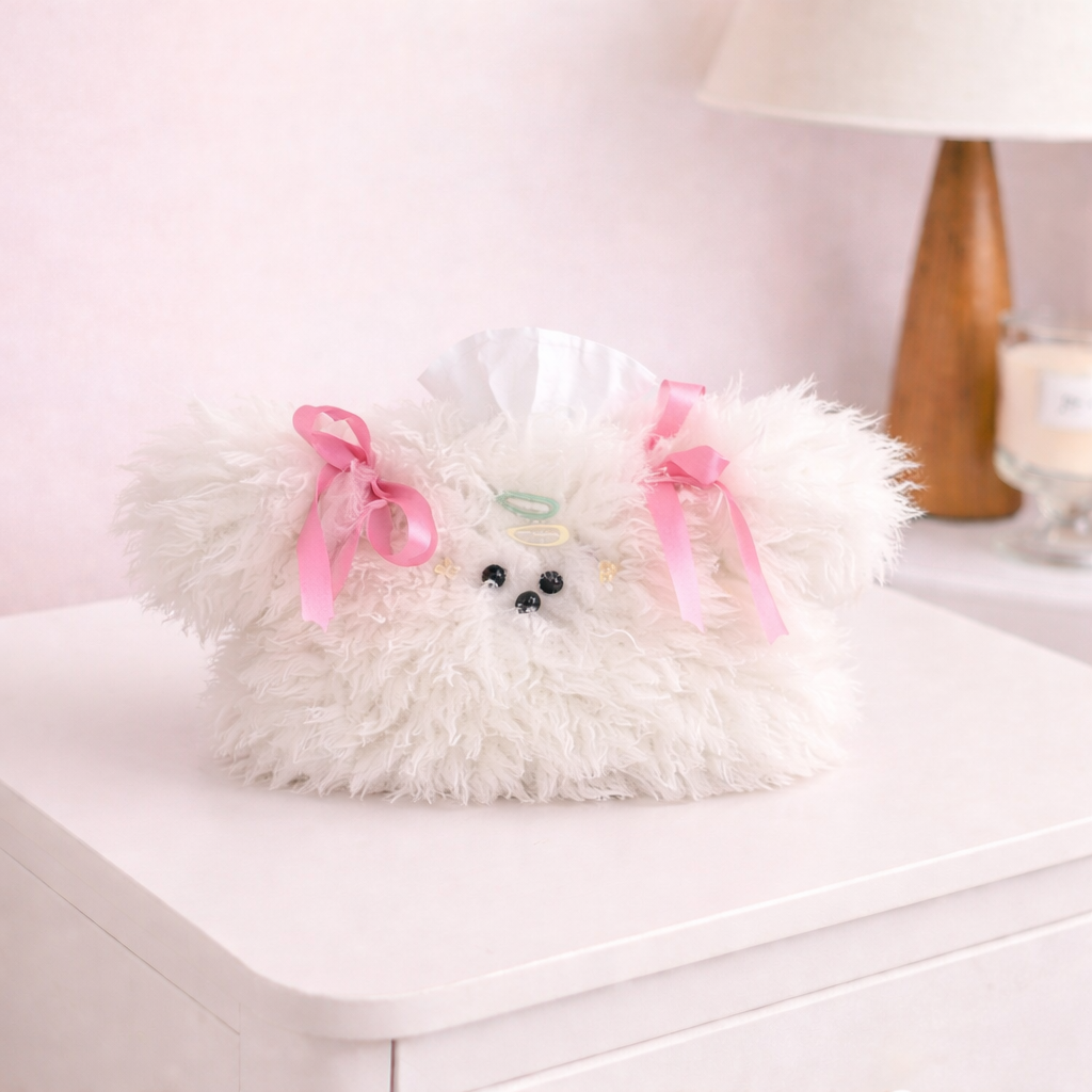 White fluffy plush tissue holder with ribbon bows and cute face details, cozy kawaii tissue box cover for desk or bedside.